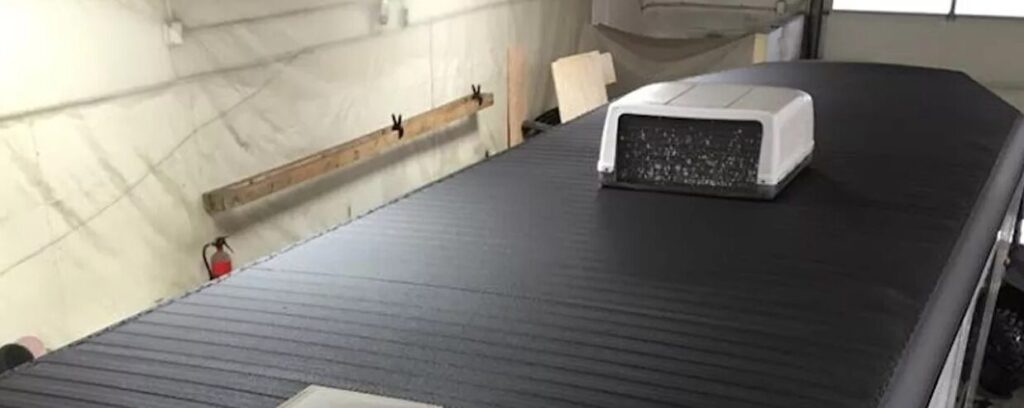 Finished: one seamless membrane over new and original sections alike.