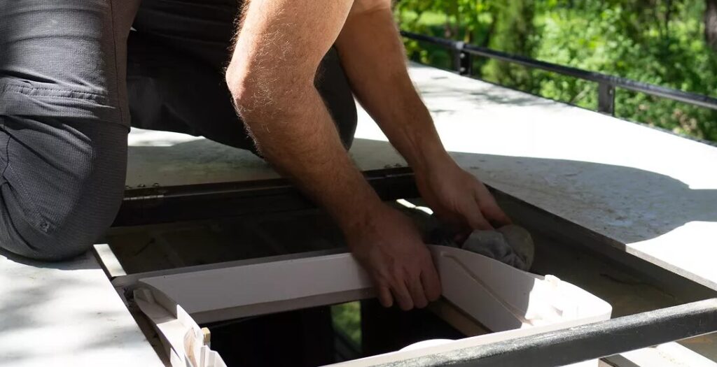 Penetrations like vents and skylights are where sealant fails first.